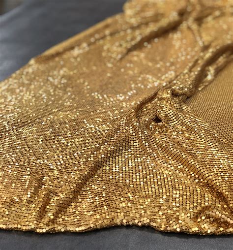 metallic shiny fabric|fabric with gold metallic threads.